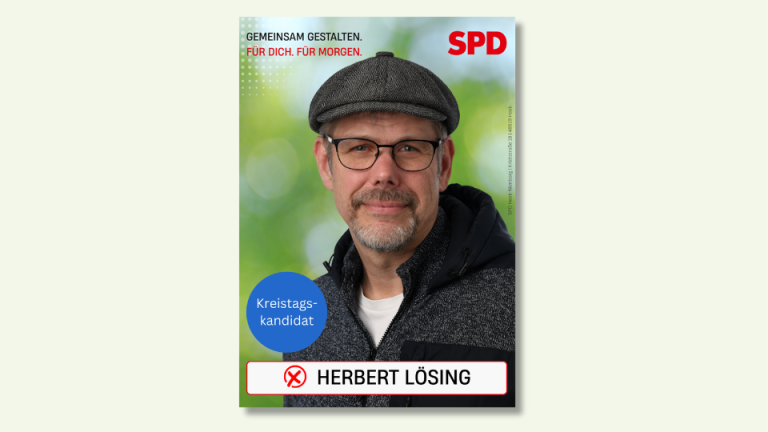 Wahlplakat Porträt von Herbert vor unscharfem Hintergrund.